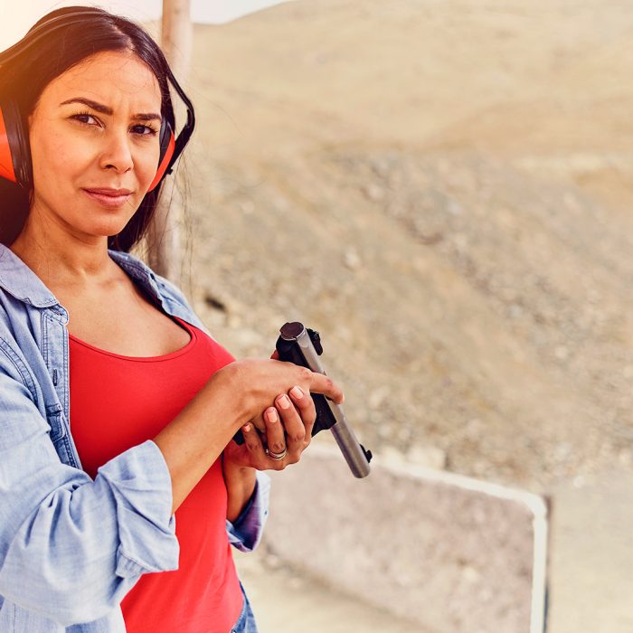woman practicing firearms self-defense training