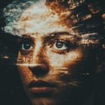 Double exposure of a woman's face with emotional expression and abstract landscape overlay—symbolizing the inner experience of stress, safety, and nervous system states as described in Polyvagal Theory.