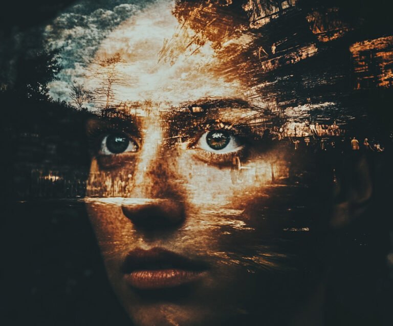Double exposure of a woman's face with emotional expression and abstract landscape overlay—symbolizing the inner experience of stress, safety, and nervous system states as described in Polyvagal Theory.